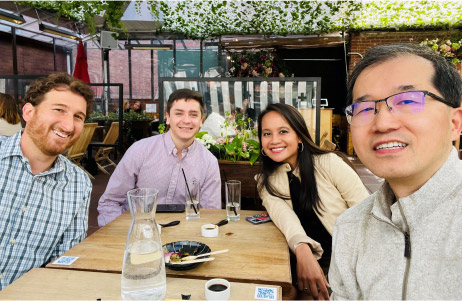 Bluestar team members enjoying lunch at outdoor restaurant