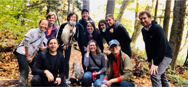 Bluestar team in casual attire, enjoying outdoor outing